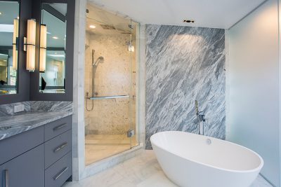 bathroom with marble walls