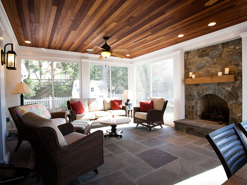 sun room with board ceiling
