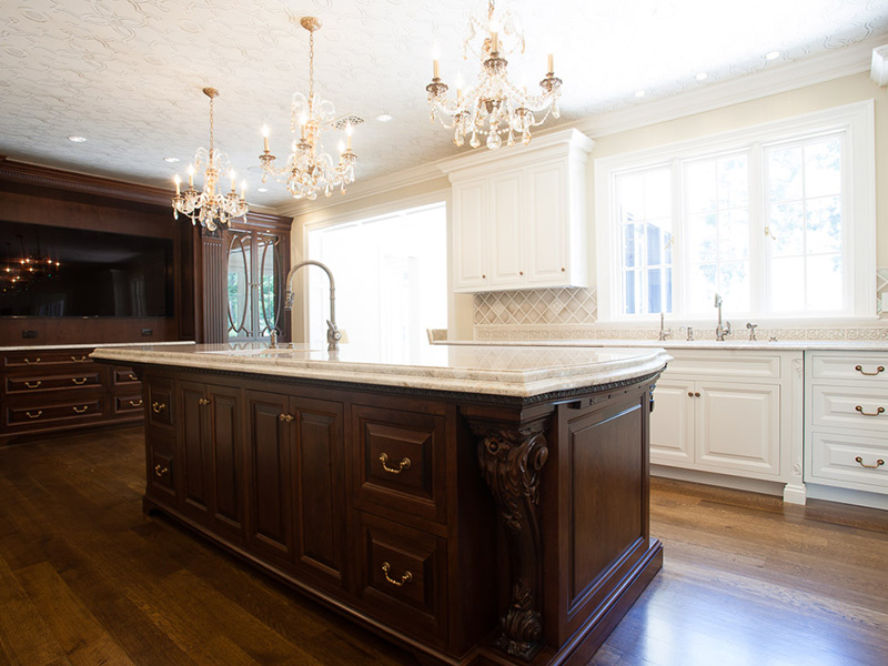 wooden kitchen island with gold accents